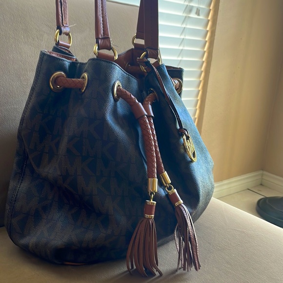 Gently used Mikael Kors monogram purse - Picture 3 of 6